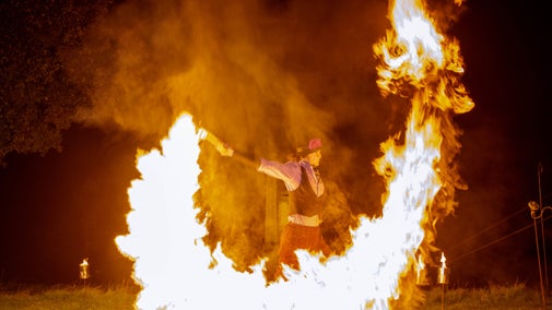 Fire dancers performing at Halloween at Quarry Bank